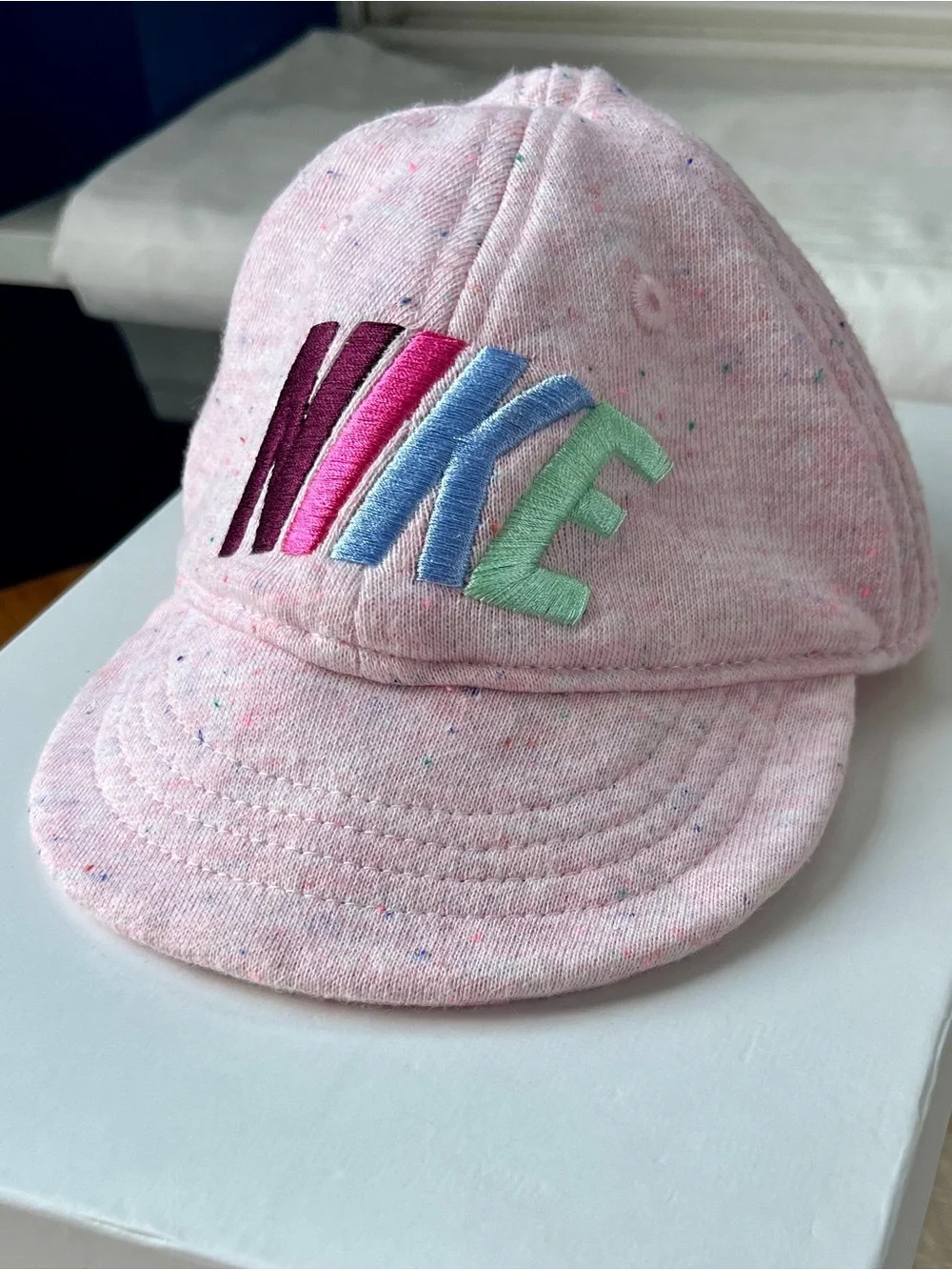 Nike Baby French Terry Knit Cotton Cap in “Speckled Pink Foam”